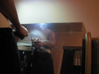 Masturbating in front of mirror